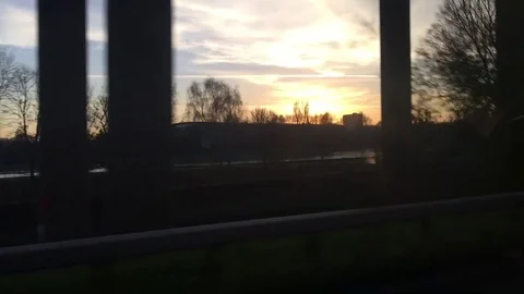 Dynamic Moving Shot , inside a car, as concrete motorway and bridge pass by 動画素材 72627619