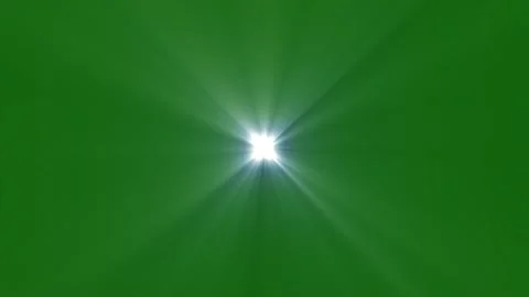 Dynamic Moving Sun Rays and Bright Lens Flare on Green Background Vídeos de archivo 334991759