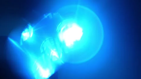 Dynamic multi-colored light flares with glowing iridescent edges and bokeh Stock Footage 332811764