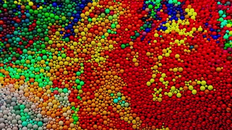 Dynamic multicolored background. Abstract 3D animation consisting of spheres  Stock Footage 224810164