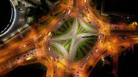 Dynamic night view of roundabout in mesmerizing hyperlapse Stock Footage 258486932