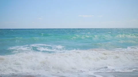 Dynamic ocean swells rolling in with white foam in 4k slow motion 120fps Stock Footage 267568180