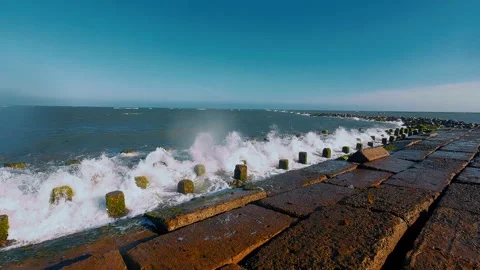 Dynamic Ocean Waves Crashing Against Concrete Breakwater Jetty Stock Footage 336921800