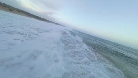 Dynamic ocean waves surge toward shore Video stock 345148726