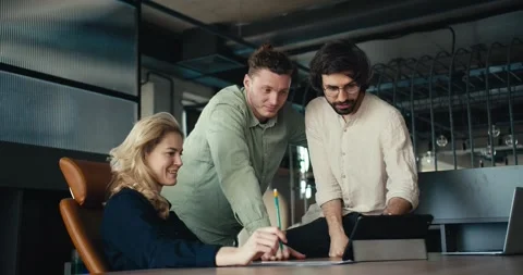 Dynamic Office Team: Brunette Guys, Blonde Woman, Laughter, and Success Stock Footage 242900780