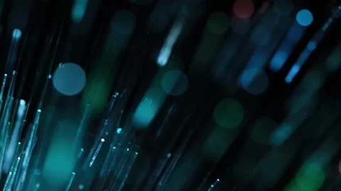 Dynamic optic fiber light points shifting colors rapidly in a dark background. Stock Footage 342764401