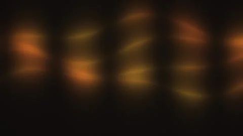 Dynamic orange light patterns on a dark background with Stock Footage 338318421