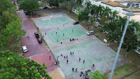 Dynamic overhead perspective showcases energetic urban sporting activities .. Stock Footage 339037318