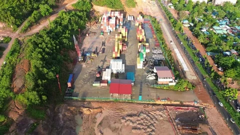 Dynamic overhead view showcasing expansive intermodal cargo terminal with i.. Video stock 337284094