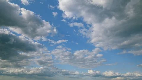 A dynamic overview of a cloudy sky filled with changing and evolving patterns of Stock Photos