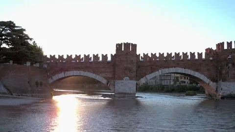 Dynamic Panning On The River In The Sunrise Of Ponte Scaligero. Verona, Italy 스톡 동영상 81453968