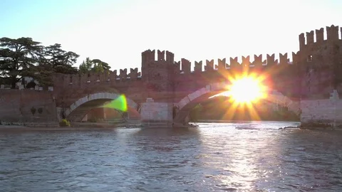 Dynamic Panning On The River In The Sunrise Of Ponte Scaligero. Verona, Italy 스톡 동영상 81455211