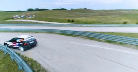 Dynamic panorama drone shot of a racing car Stock Footage 89416282
