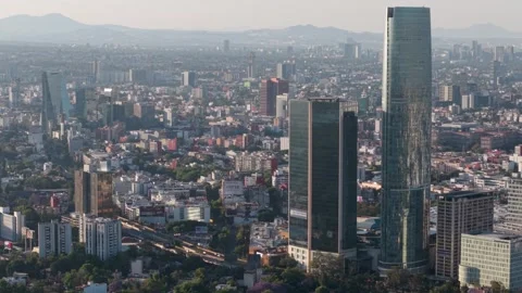 Dynamic parallax drone shot of urban architecture in Mexico City Stock-Footage 304845960