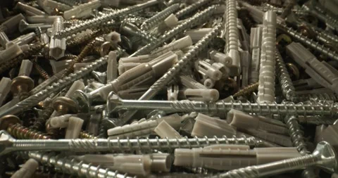 Dynamic Perspective Revealing Cluttered Inventory Of Fasteners And Plastic Ancho Stock Footage 331721058