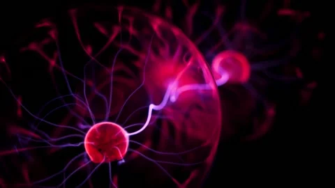 Dynamic plasma ball discharge with blue and purple neon lightning in motion Stock Footage 333929334
