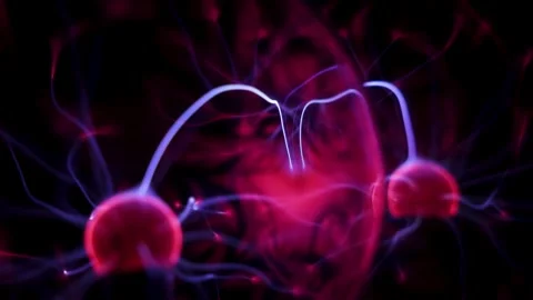 Dynamic plasma ball discharge with blue and purple neon lightning in motion Stock Footage 333929574