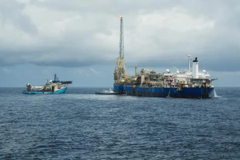 Dynamic positioning DP operations near FPSO tanker. Supply fleet job Stock Photos