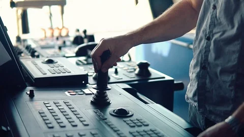 Dynamic positioning officer operationg bridge ship equipment of vessel Video stock 108749956
