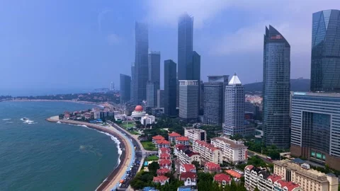 Dynamic Qingdao CBD and Coastal Cityscape Under Cloudy Sky Stock Footage 330948045