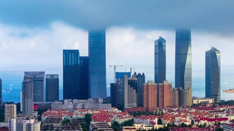 Dynamic Qingdao Cityscape Time-lapse: Skyscrapers, Ocean &amp; Rolling Clouds Stock Footage 330880429