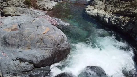 Dynamic Rapids Flowing Over Ancient, Sculpted Rocks Stock-Footage 253580961