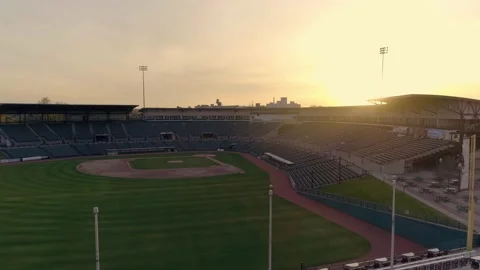 Dynamic rising drone shot of a baseball stadium in Rochester NY Stock Footage 170369438