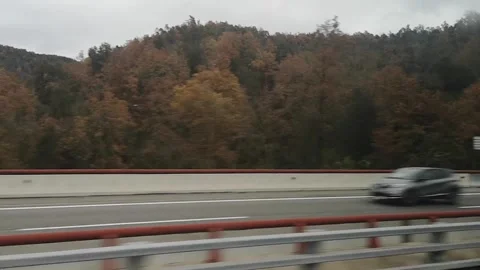 Dynamic road trip view from a bus window in Catalonia Stock Footage 310091156