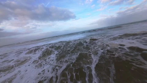 Dynamic sea surface with foamy waves breaking under twilight Stock Footage 344675343
