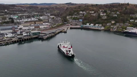 Dynamic shot of Calmac ferry MV Coruisk approaching Oban pier Stock Footage 239450370