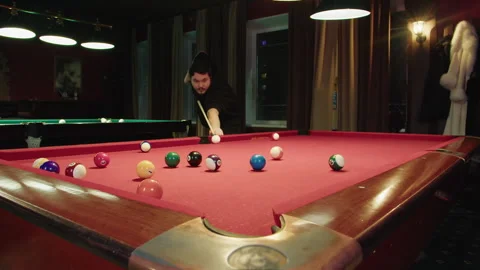 Dynamic shot capturing stylish lighting and lively billiard action 库存影片 329192982