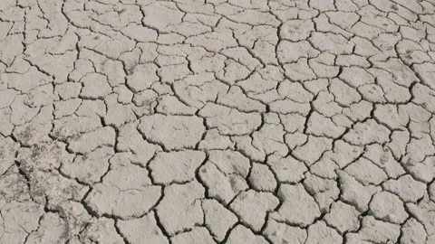 Dynamic shot of cracked soil ground of dried lake Stock Footage 151489853