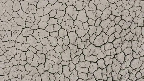 Dynamic shot of cracked soil ground of dried lake Stock Footage 151489883