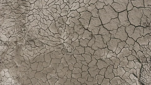 Dynamic shot of cracked soil ground of dried lake Stock Footage 151489958
