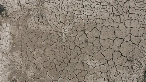 Dynamic shot of cracked soil ground of dried lake Stock Footage 151490152