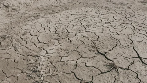 Dynamic shot of cracked soil ground of dried lake Stock Footage 151490218