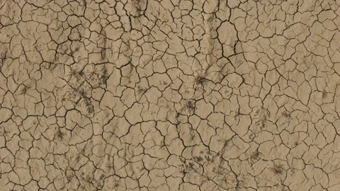 Dynamic shot of cracked soil ground of dried lake Stock Footage 151490251