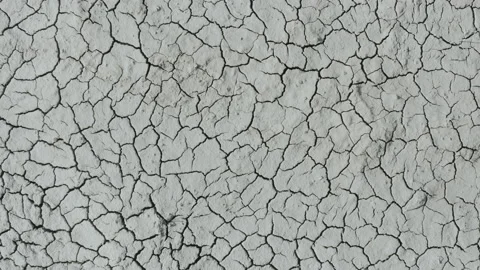 Dynamic shot of cracked soil ground of dried lake Stock Footage 151490305
