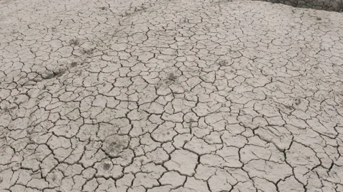 Dynamic shot of cracked soil ground of dried lake Stock Footage 151490508
