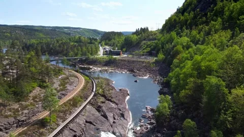 Dynamic Shot Lumber Slide, Steinsfoss Power Station, River and Bridge, Norway Stock Footage 258289988