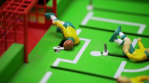 Dynamic shot moving from midfield to an empty foosball goal. Stock Footage 321372074