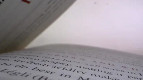 Dynamic shot my camera panning through a book Stock Footage 132024515
