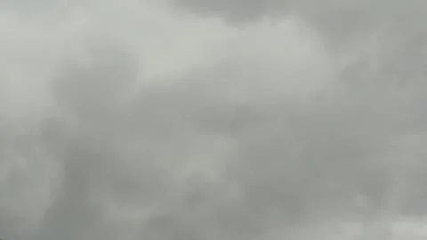 Dynamic Sky Canvas: Ever-Shifting Gray Clouds Unfolding Across the Vast Exp.. Video stock 325230905