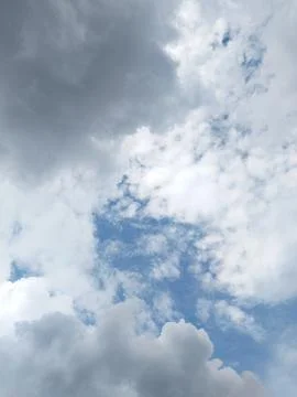Dynamic Sky: Mixed Clouds &amp; Blue Patch Stock Photos