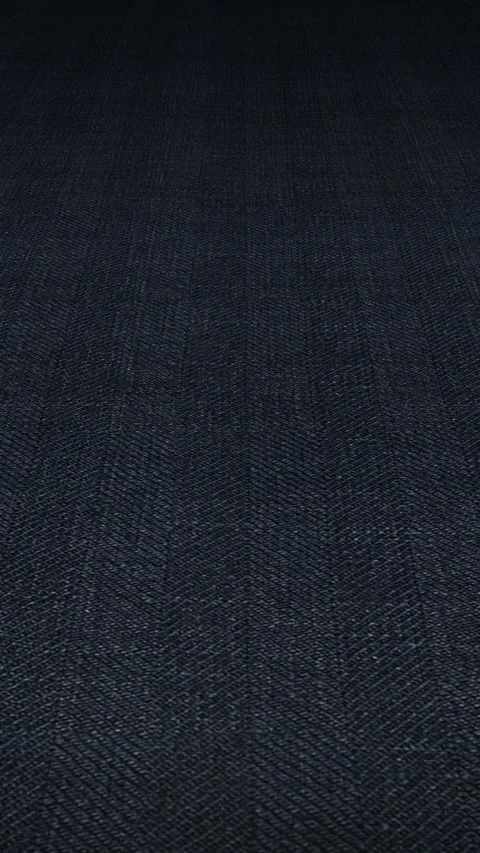 Dynamic slider view across Italian dark steel blue herringbone linen weave 스톡 동영상 343211625
