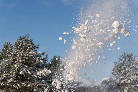 Dynamic Snow Explosion Against Clear Blue Winter Sky Stock Photos