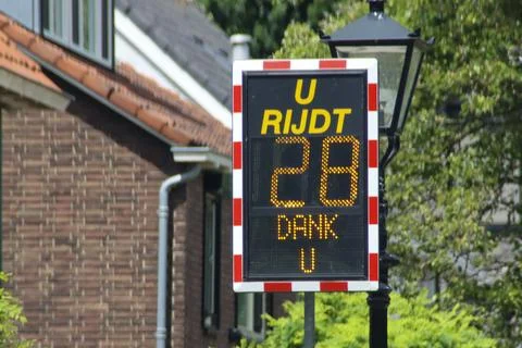 Dynamic speed display to warn car drivers for their speed Stock Photos