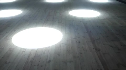 Dynamic Stage Lighting Effects On Empty Wooden Floor Stock Footage 334661079