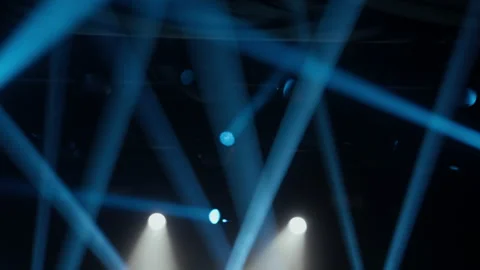 Dynamic Stage Lights Show with Blue Beams Stock Footage 335041414