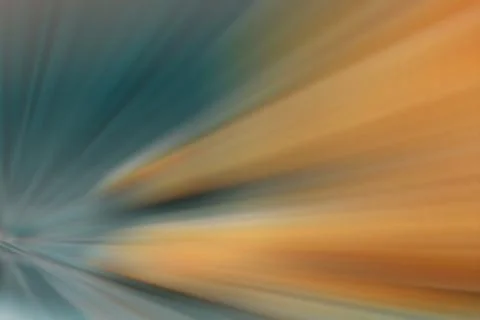 Dynamic starburst with colorful light rays in orange and blue Stock Illustration